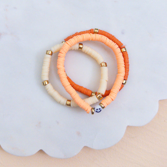 Coral Smiley Beaded Bracelet Stack