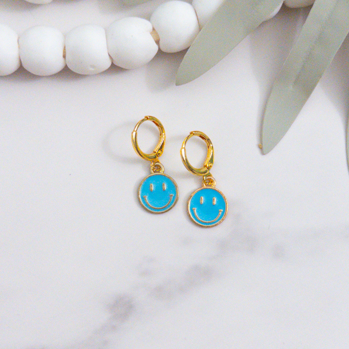 Bright Blue Gold Smiley Huggie Earrings